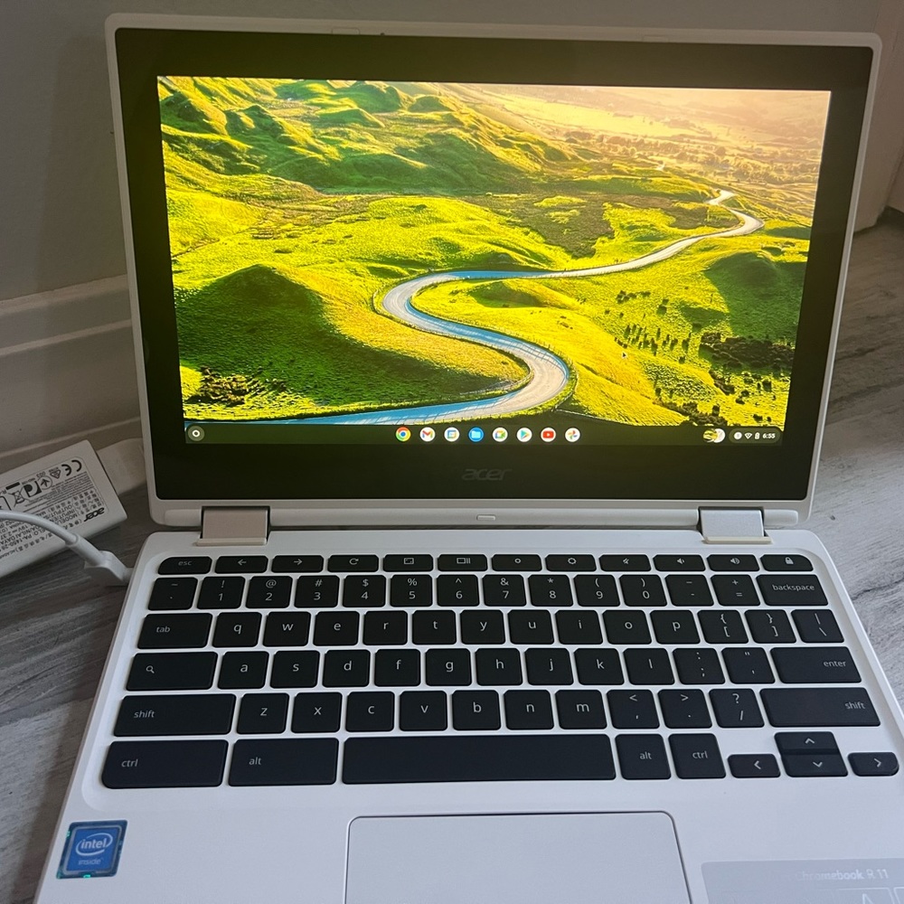 Like new Acer R11 Chrome book. Foldable, comes with charger and is already setup